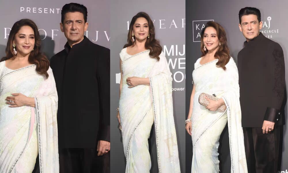 Madhuri Dixit in pastel saree with husband Sriram Nene at Mijwan show